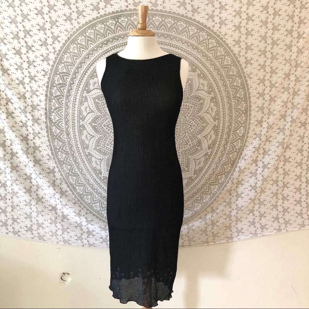 Black slip-over dress with blue flower detailing